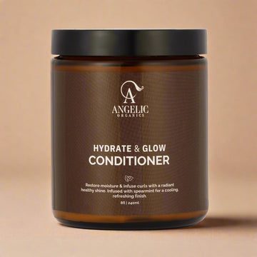 Angelic Organics plant-based deep moisture conditioner on beige background